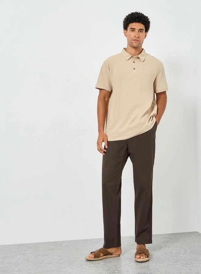 ستايلي بنطال كتان بكسرات وقصة مستدقة للرجال